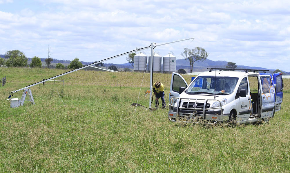 Environdata Technician Servicing Customer's Weather Station with 10m Mast